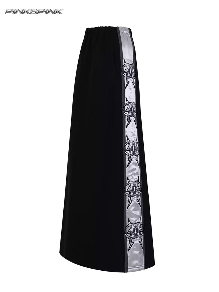PINKSPINK MIRROR silver-panel maxi skirt in black and silver — side garment-only view showing the silver graphic panel