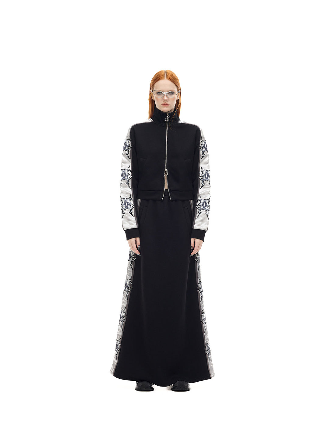 PINKSPINK MIRROR silver-panel maxi skirt in black and silver — front full-length modeled view styled with the matching jacket