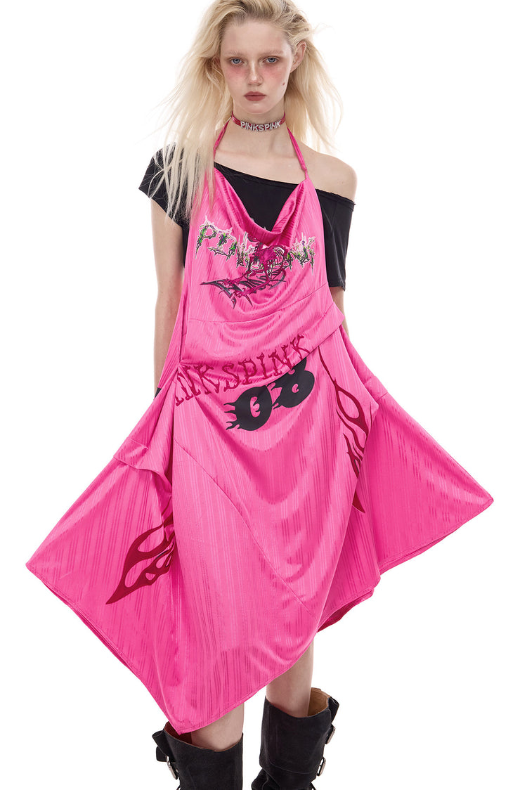 PINKSPINK asymmetric graphic halter dress in pink — front modeled view with the layered hem held open