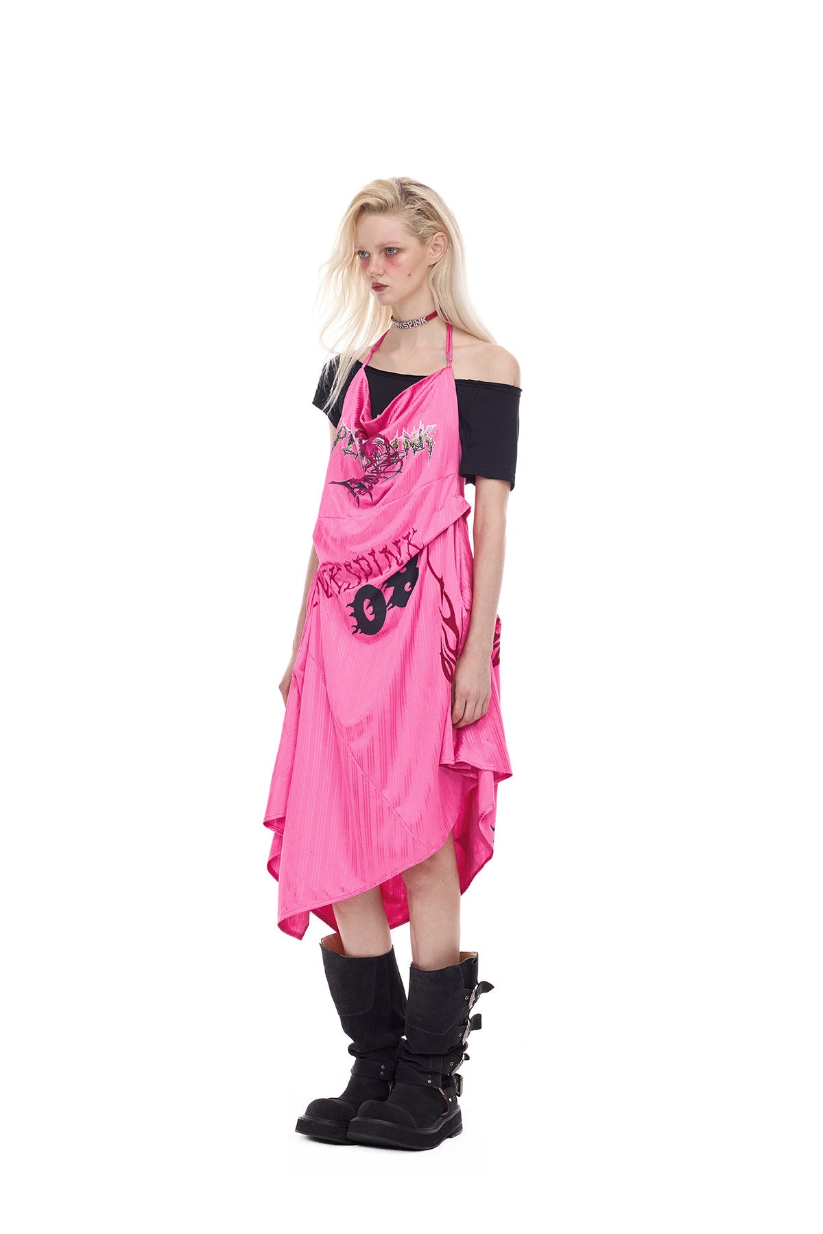 PINKSPINK asymmetric graphic halter dress in pink — three-quarter full-length modeled view showing the side drape