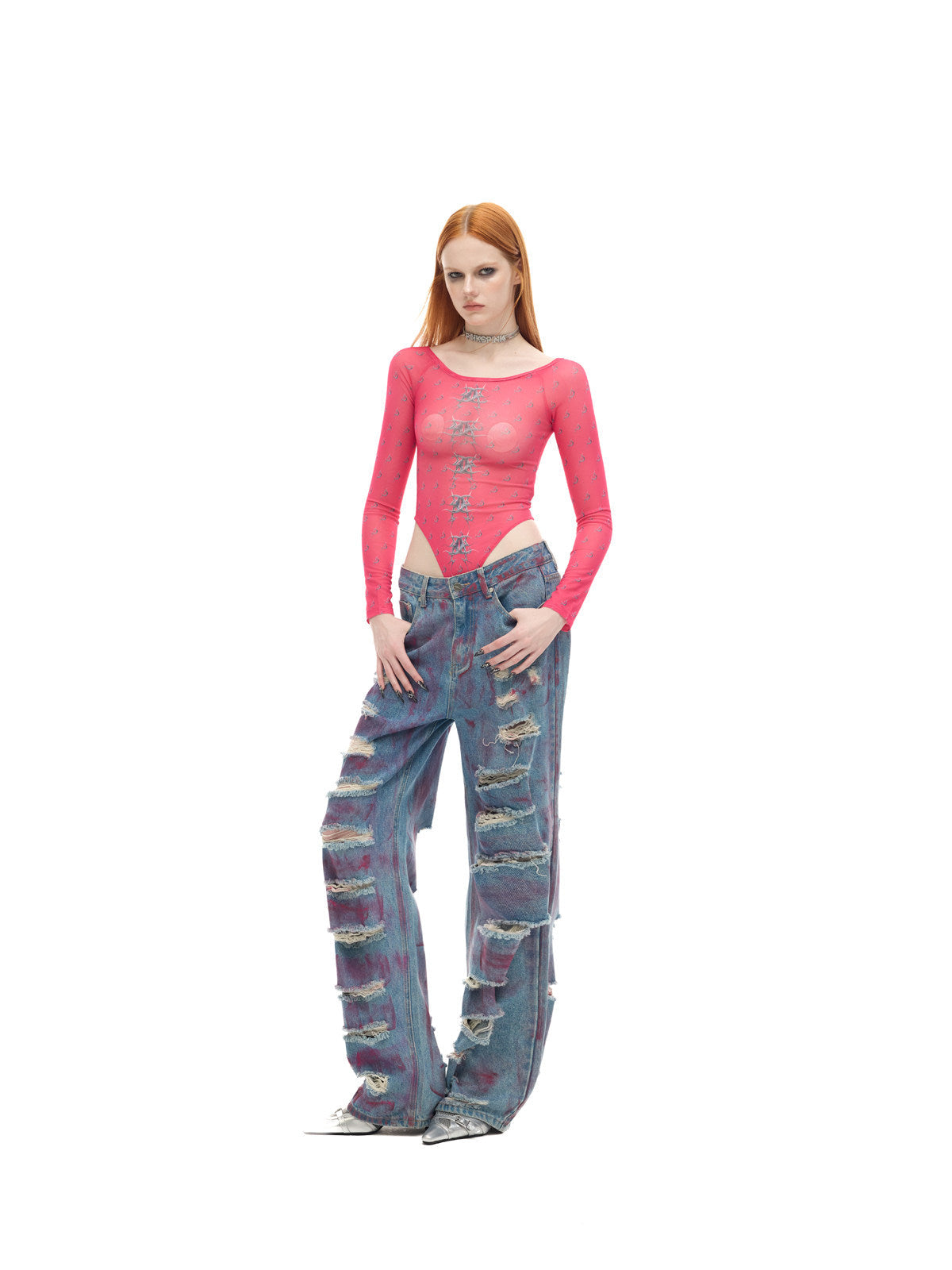 PINKSPINK WASTELAND pink-coated blue jeans — three-quarter modeled view with hands at the front pockets