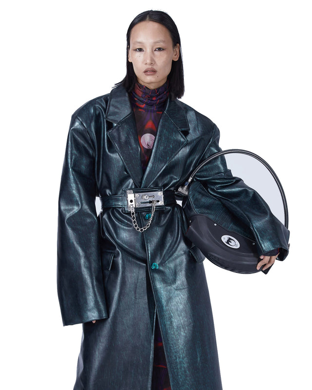EMBRYO MATRIX buckle PU leather trench coat on a clean white background