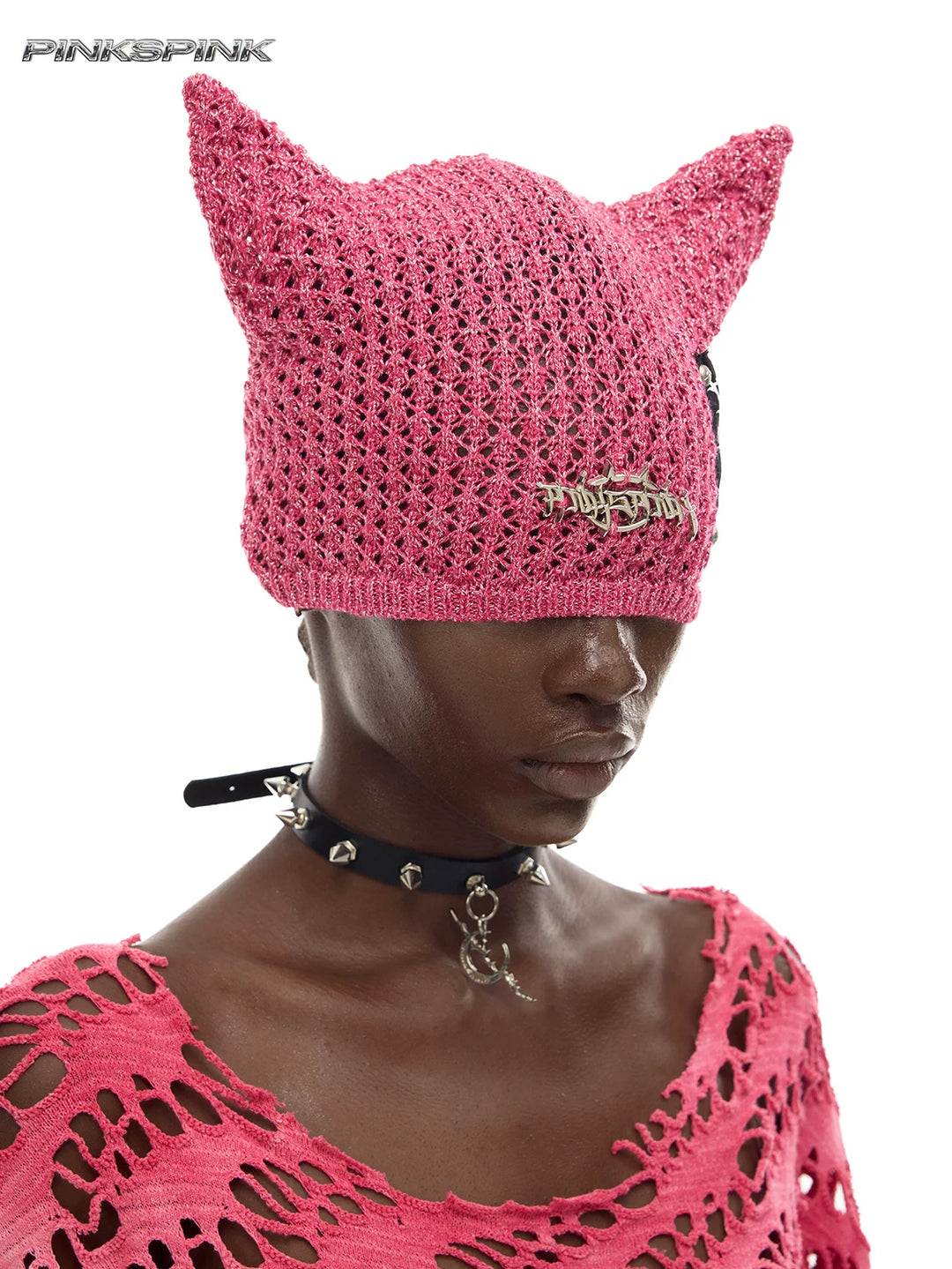 PINKSPINK DEVILCAT distressed cat-ear knit beanie in pink — three-quarter modeled close-up