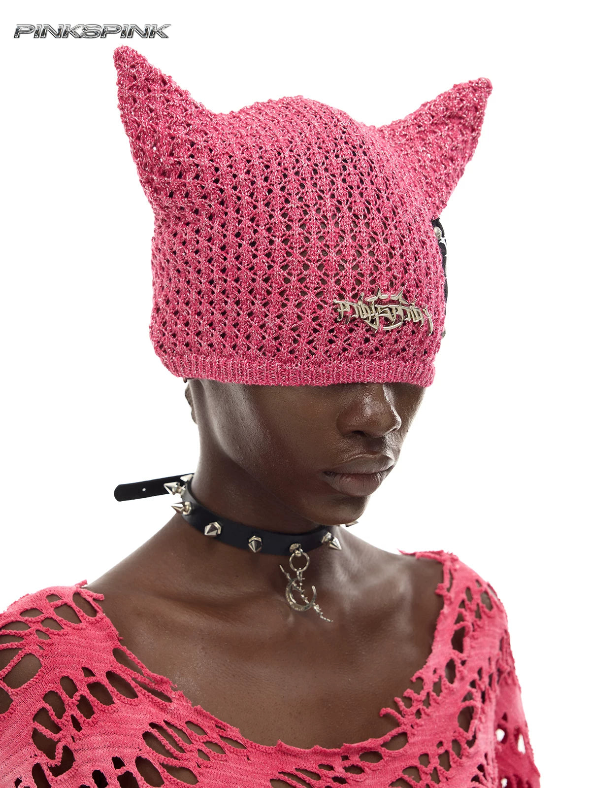 PINKSPINK DEVILCAT distressed cat-ear knit beanie in pink — three-quarter modeled close-up