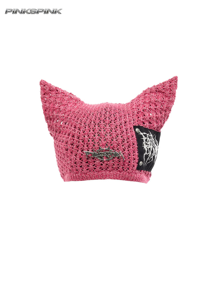 PINKSPINK DEVILCAT distressed cat-ear knit beanie in pink — garment-only view of the knit and graphic patch