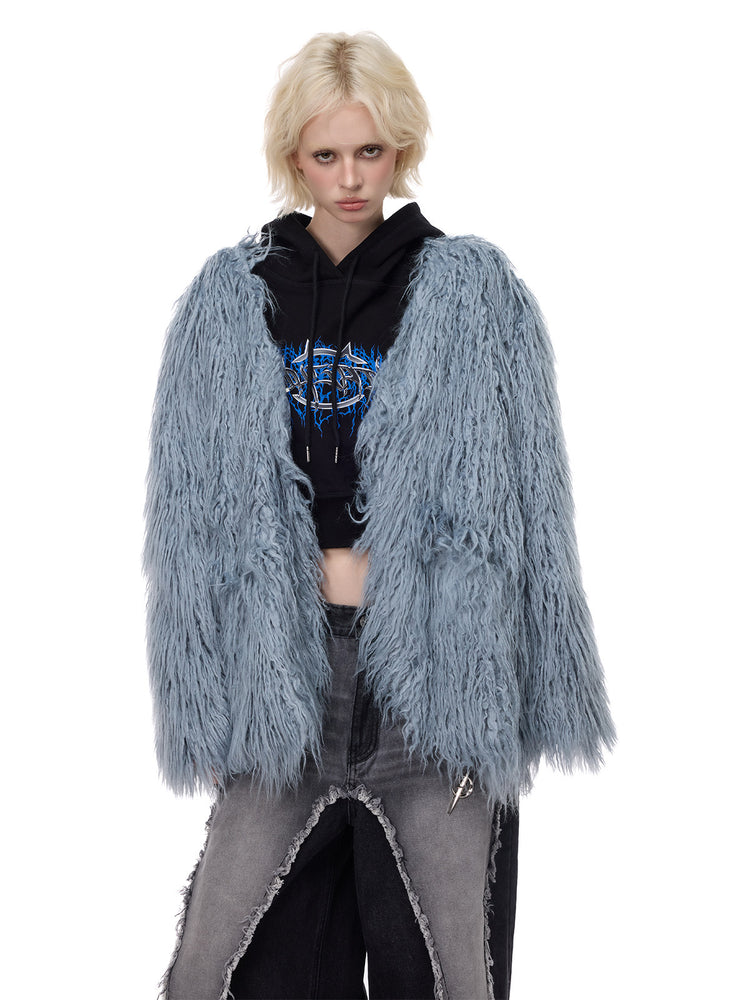 PINKSPINK CLOUDNINE shaggy V-neck faux-fur coat in blue — neckline and texture modeled close-up