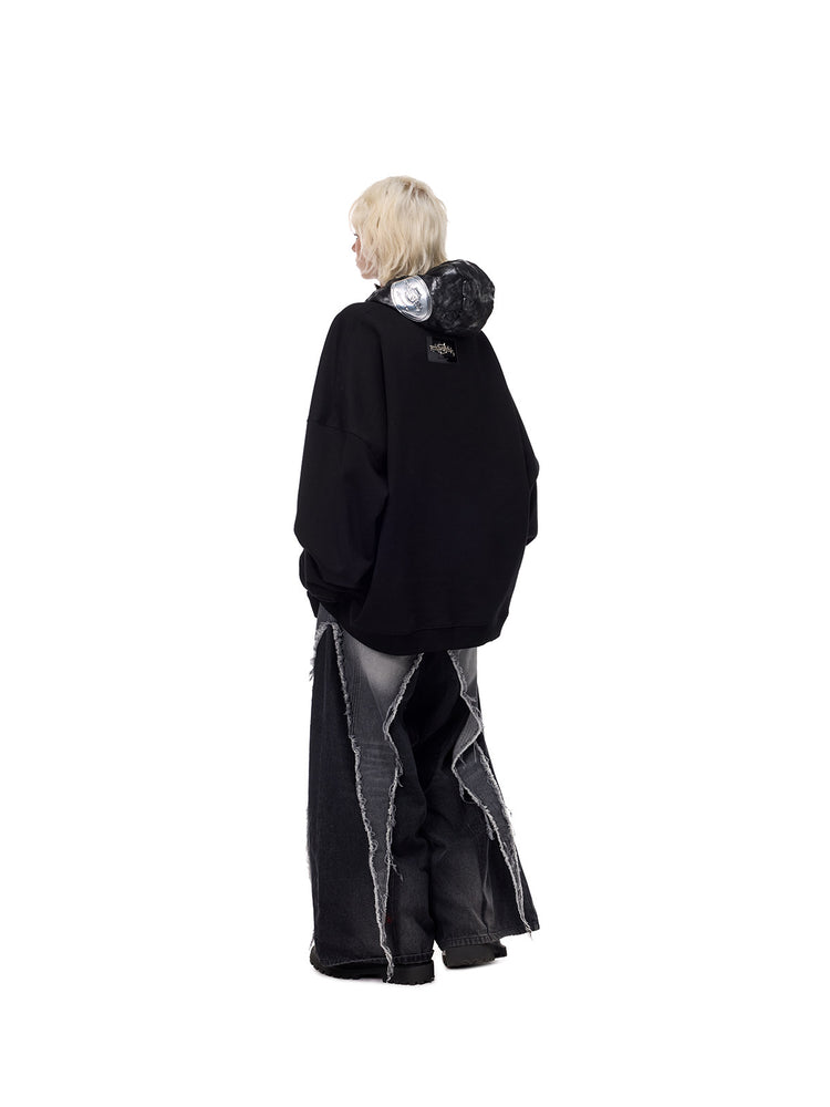 PINKSPINK ELECTRIC MOON metallic double-zip balaclava in metallic black — three-quarter back modeled view worn down around the neck