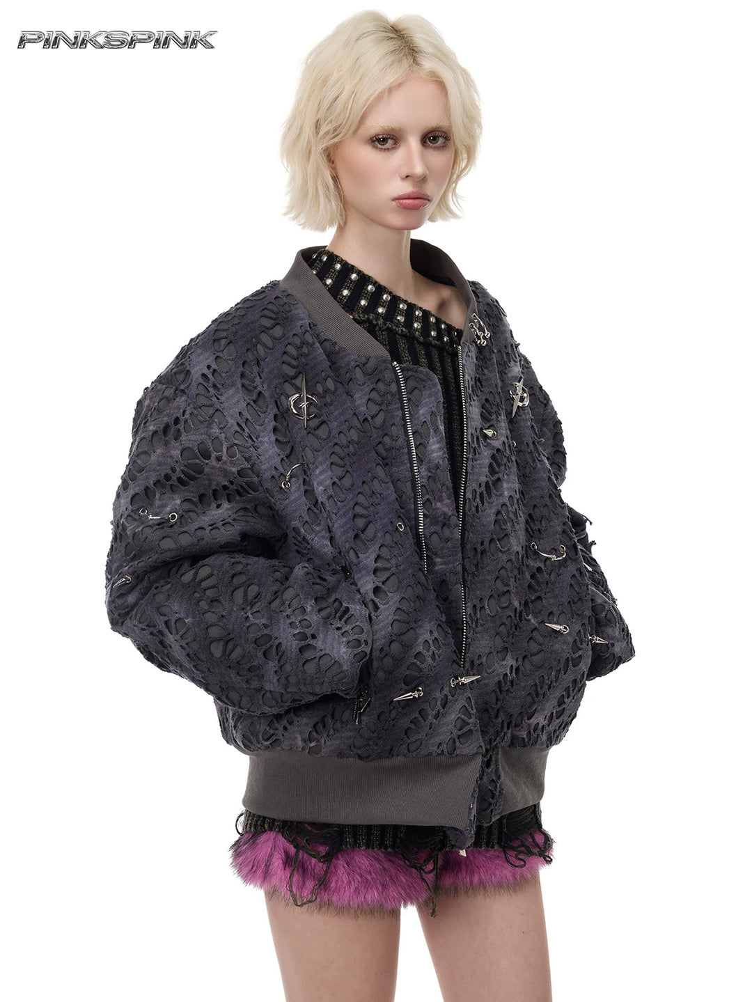 PINKSPINK ELECTRIC MOON distressed studded padded bomber jacket in charcoal gray — three-quarter modeled view with arms crossed