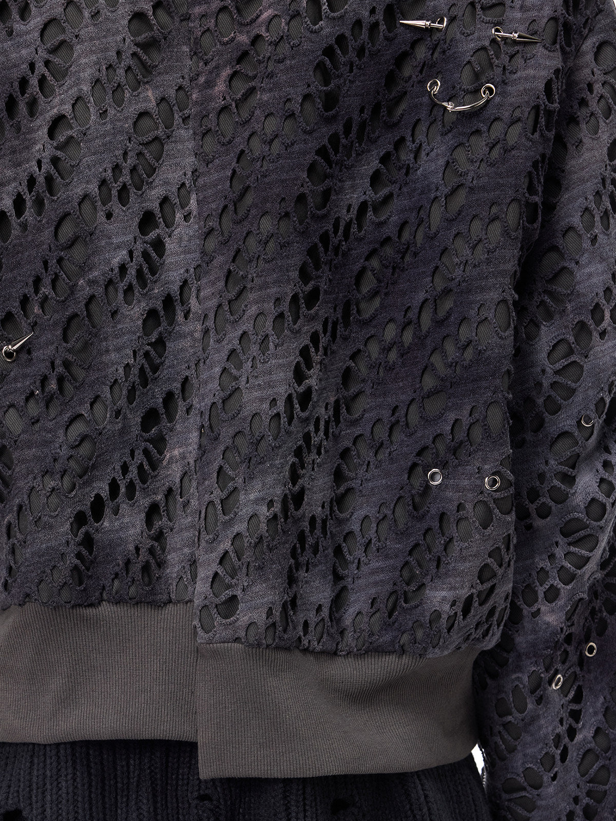 PINKSPINK ELECTRIC MOON distressed studded padded bomber jacket in charcoal gray — close-up of the front panel and metal accents