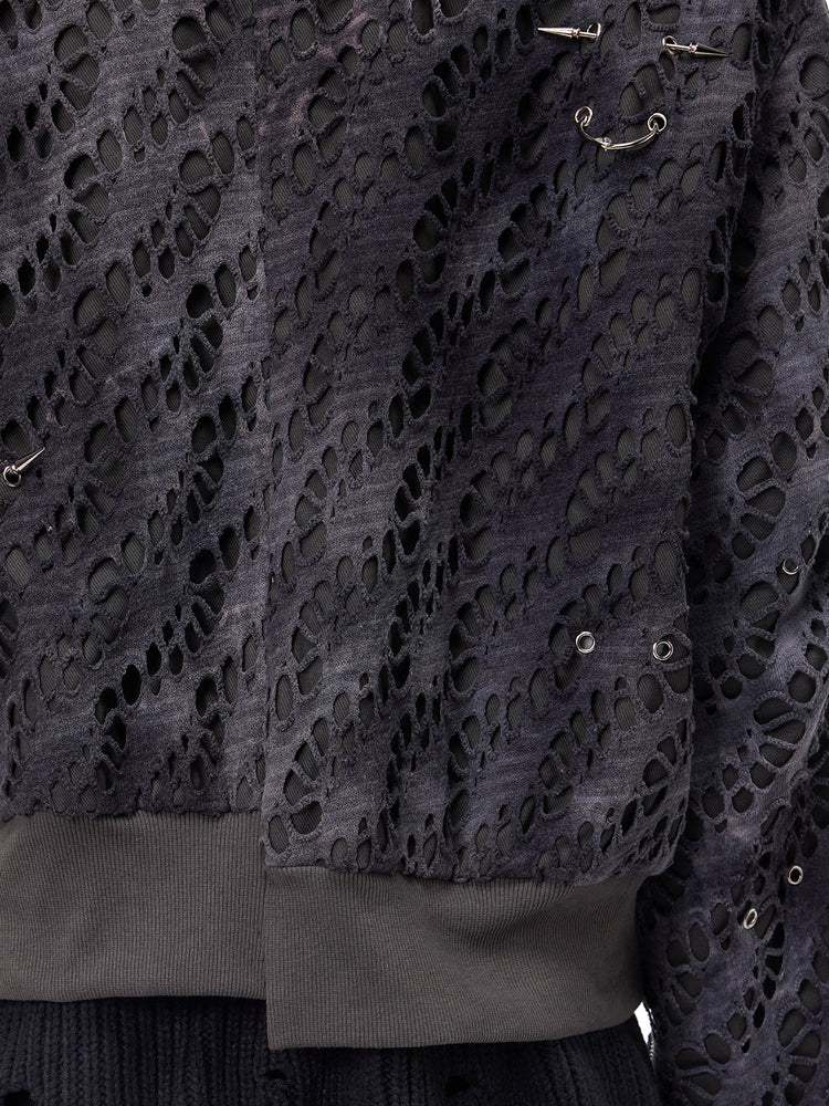 PINKSPINK ELECTRIC MOON distressed studded padded bomber jacket in charcoal gray — close-up of the front panel and metal accents