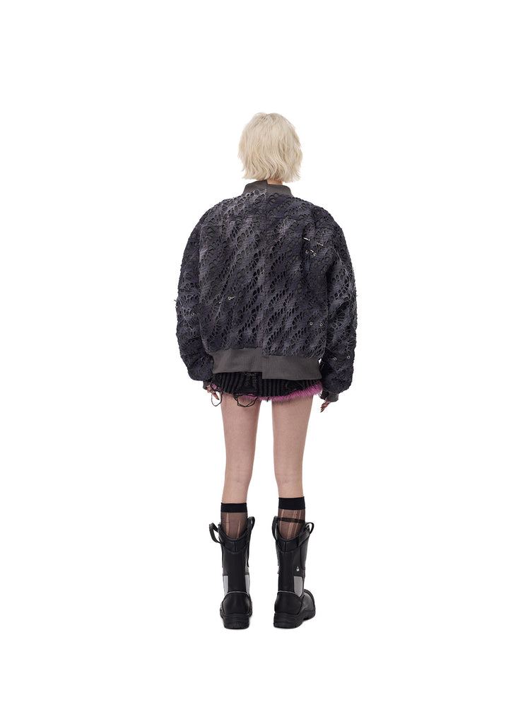 PINKSPINK ELECTRIC MOON distressed studded padded bomber jacket in charcoal gray — full-length back modeled outfit with a mini skirt