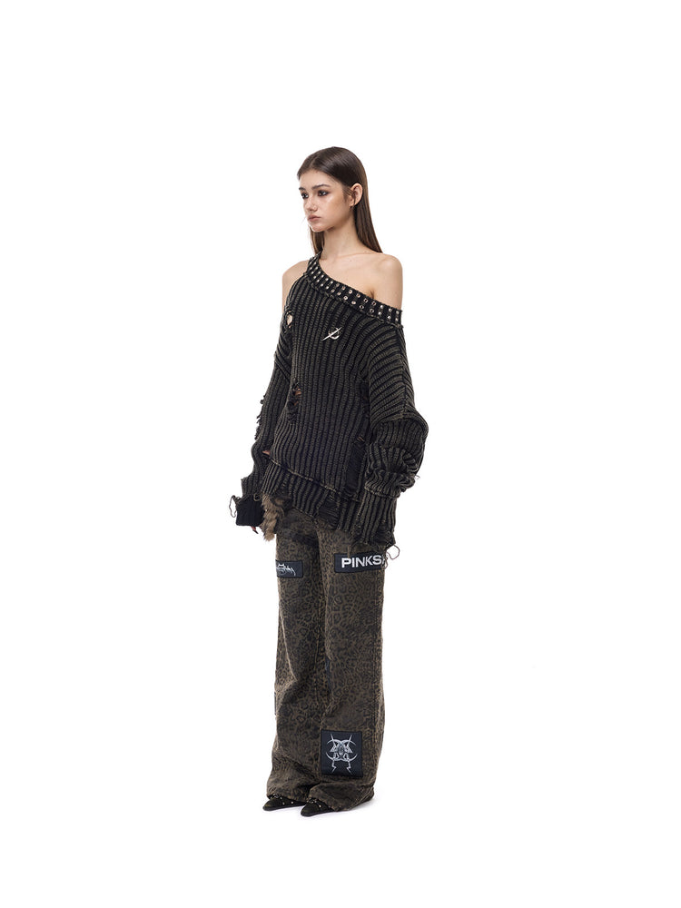 PINKSPINK ELECTRIC MOON distressed studded cold-shoulder sweater in washed black — full-length three-quarter modeled outfit with trousers