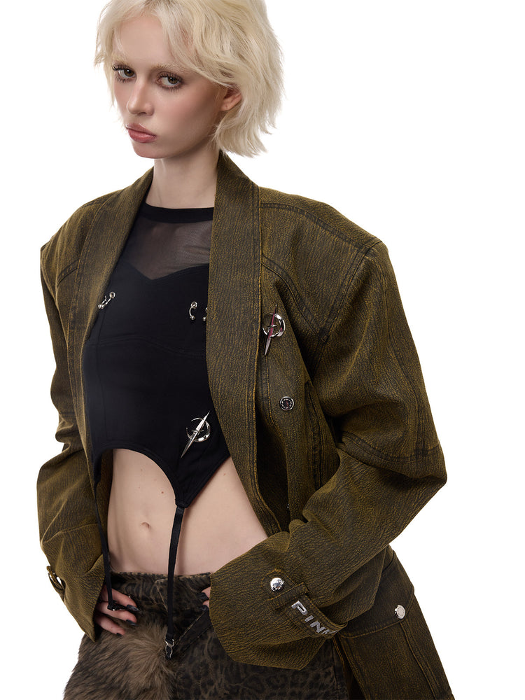 PINKSPINK ELECTRIC MOON sculpted-shoulder washed blazer in olive brown — angled close-up of the open front and textured finish