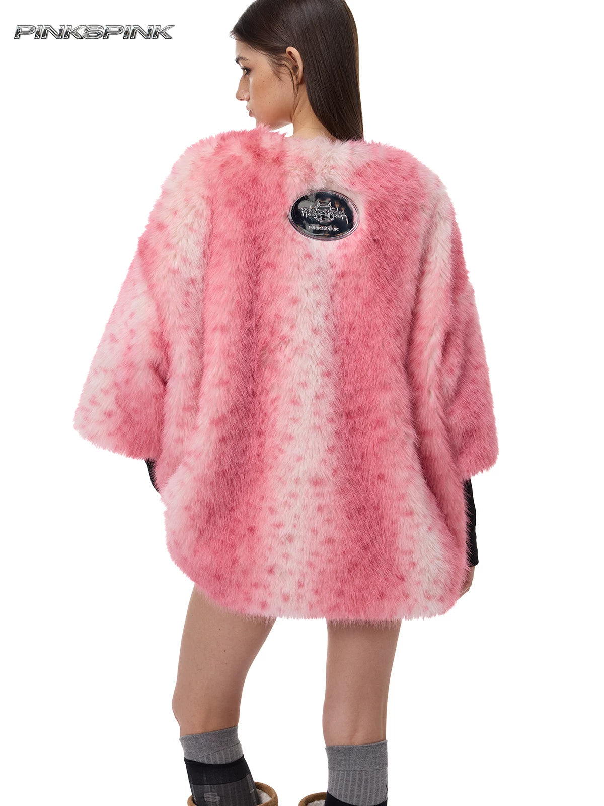 PINKSPINK ELECTRIC MOON thorn-heart faux-fur jersey in pink — angled back modeled view showing the oval brand emblem