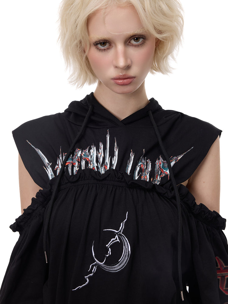 PINKSPINK ELECTRIC MOON cold-shoulder hooded sweatshirt dress in black — close-up front modeled view showing gathered seams
