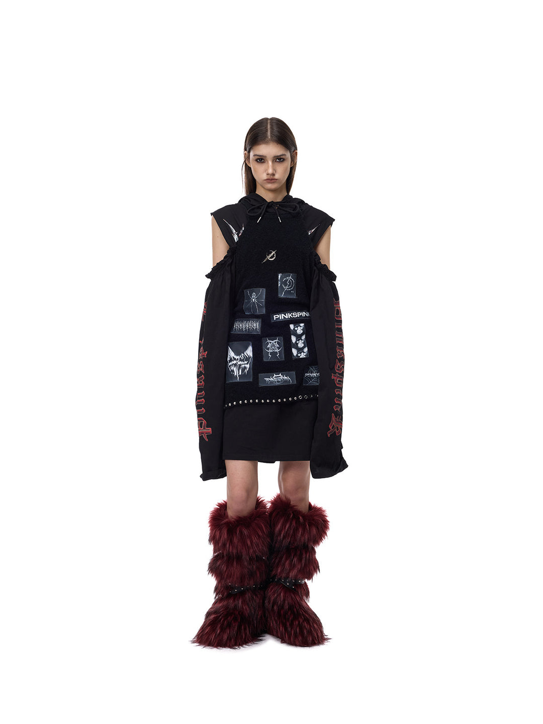 PINKSPINK ELECTRIC MOON cold-shoulder hooded sweatshirt dress in black — full-length front view layered with a separate patch vest