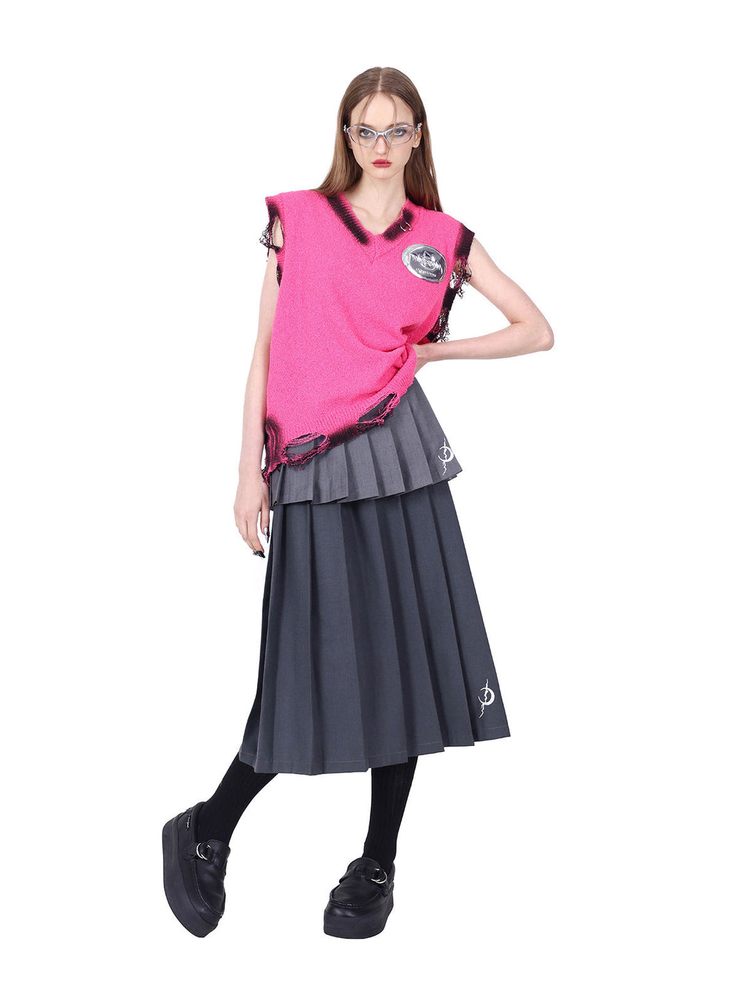 PINKSPINK REBEL detachable layered pleated skirt in gray — angled full-length modeled view showing layered pleats in motion