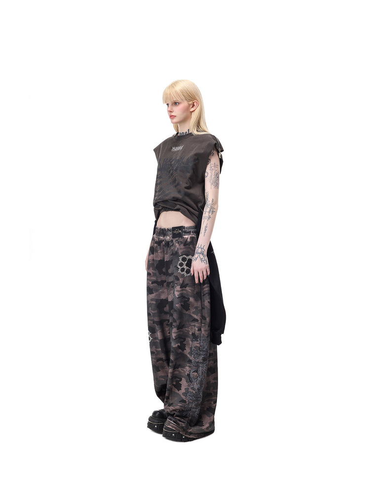 PINKSPINK REMAKE convertible thorn skirt in black gray — side full-length modeled view in tank configuration with attached black sleeves hanging behind