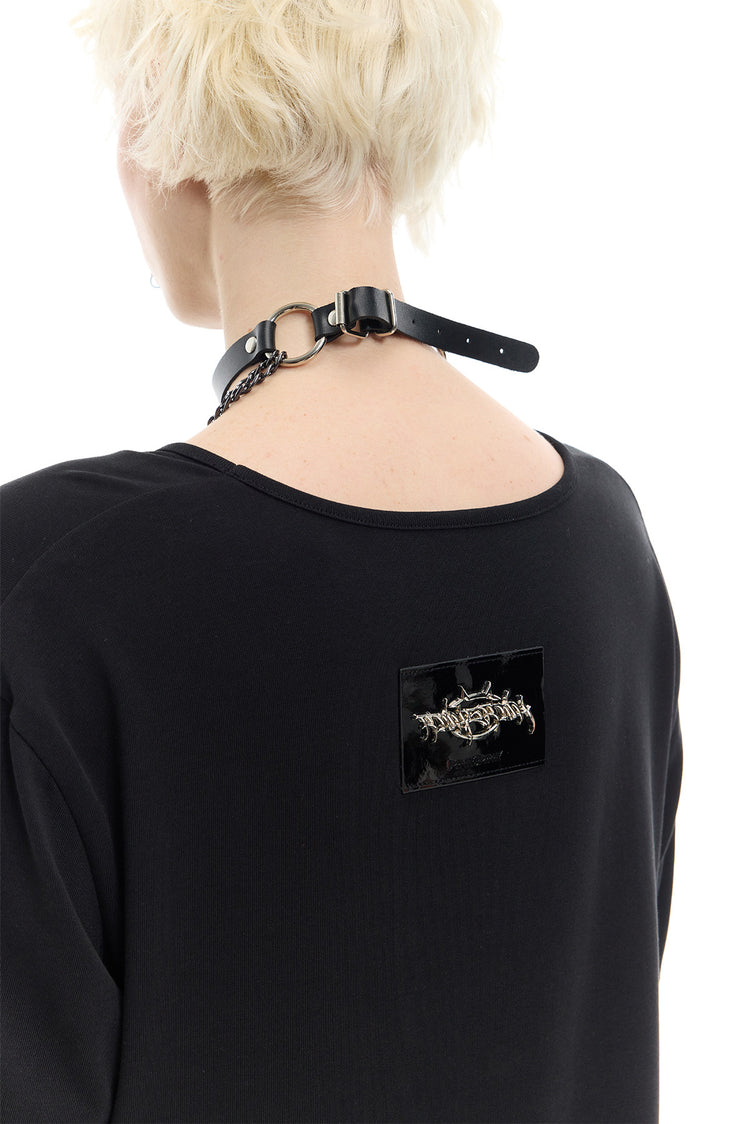 PINKSPINK REMAKE striped patchwork shirt dress in black and pink — close-up of the rear neckline and raised brand badge