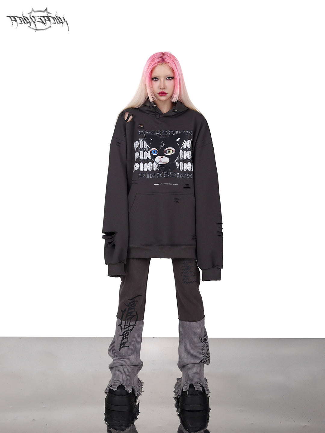 PINKSPINK DEVON CAT distressed mask hoodie in gray — front full-length modeled view styled with gray trousers