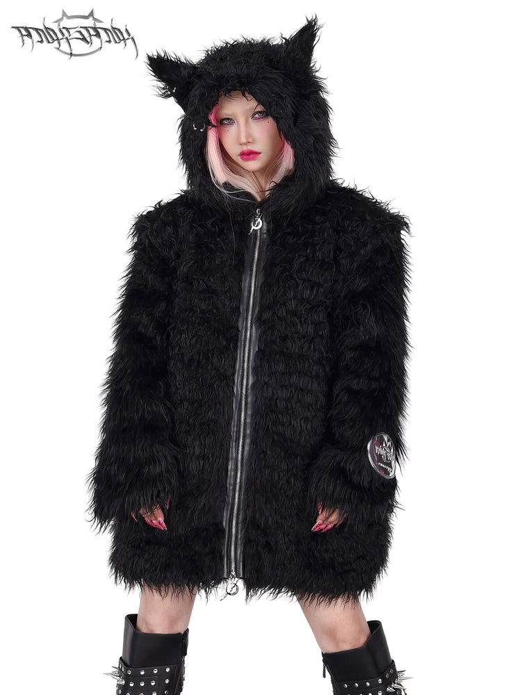 PINKSPINK DEVIL CAT pierced faux-fur jacket in black — front modeled close-up showing the cat-ear hood and shaggy faux fur