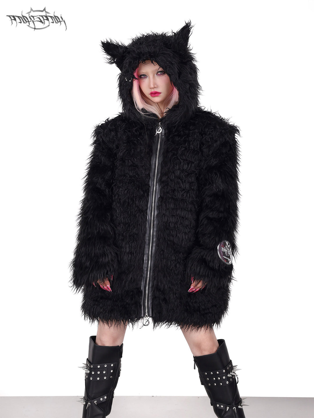 PINKSPINK DEVIL CAT pierced faux-fur jacket in black — front close-up with the hood raised corresponding to the hero image