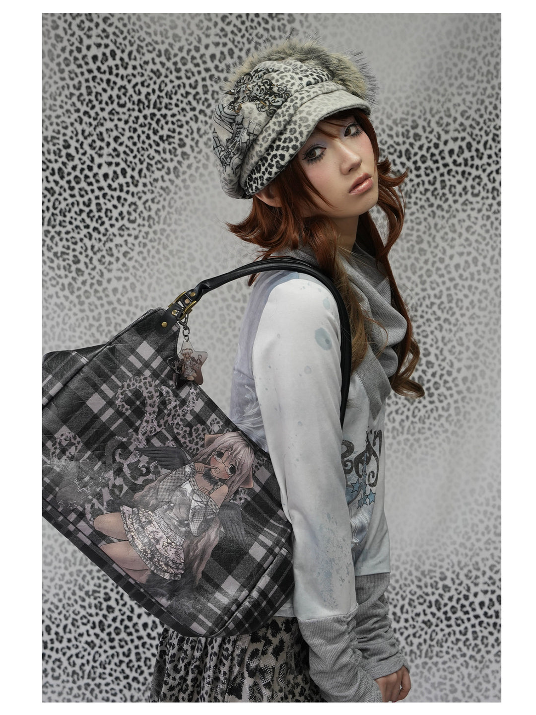 4RE1GN MYSTIC STAR slouch-neck long-sleeve tee in ice blue gray — side modeled view carrying a printed tote