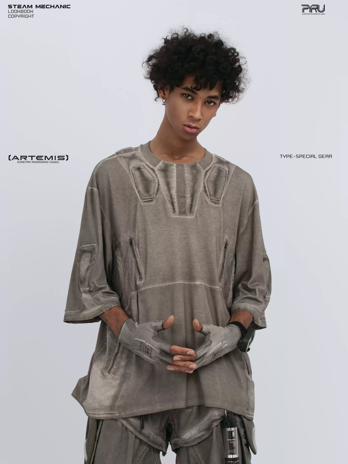 STARCORE xirang brown distressed mesh tee — front close-up with hands clasped