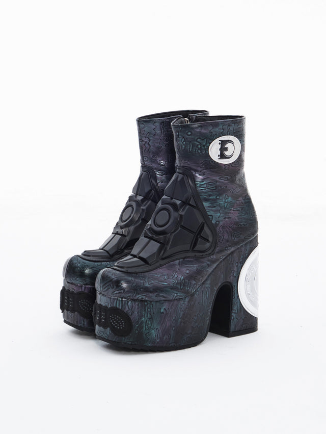 EMBRYO ORACLE black embossed PU leather platform boots, front three-quarter view with sculpted panels.