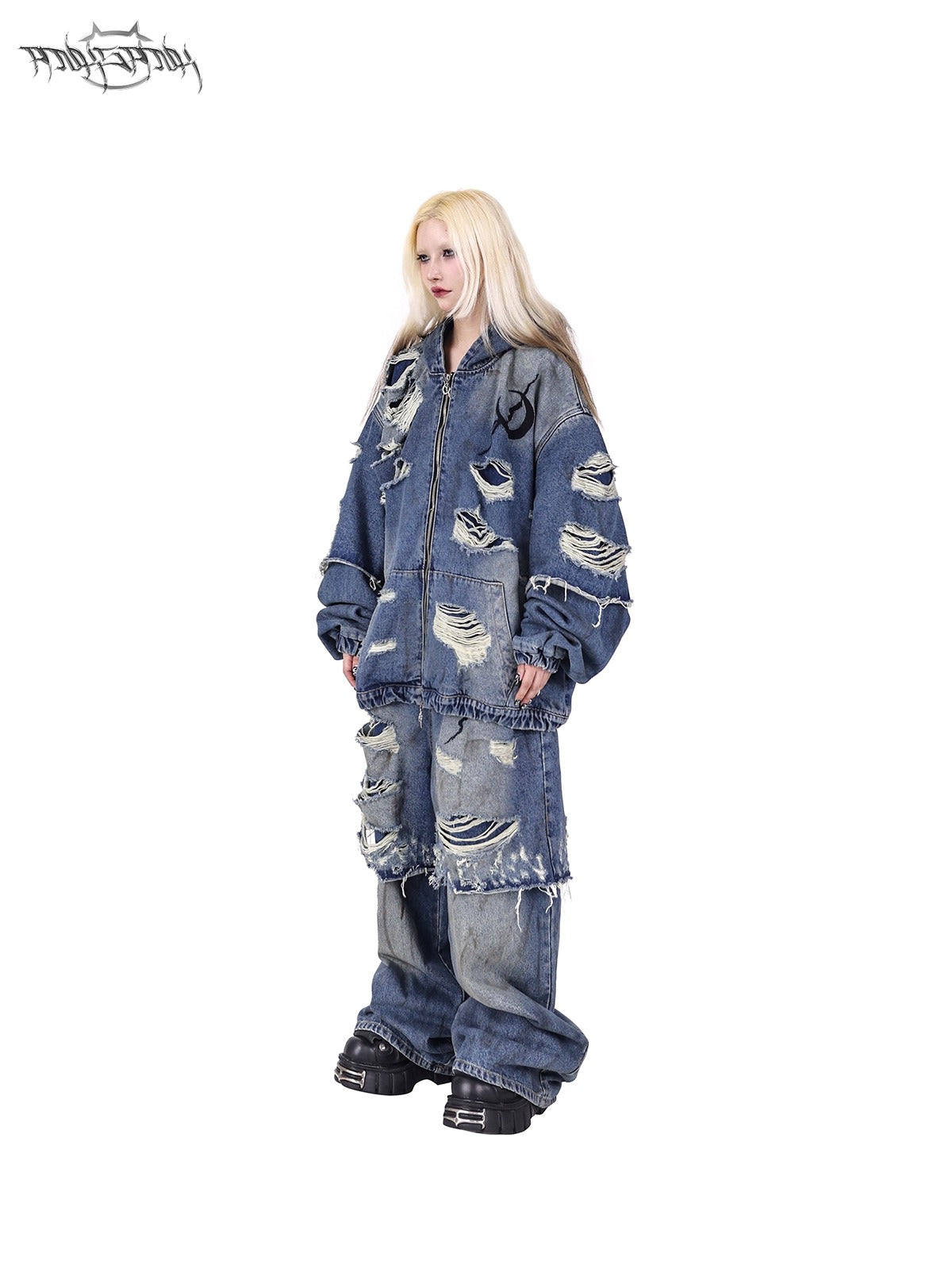 PINKSPINK ELECTRIC MOON double-layer distressed denim jacket in blue — side-angle full-length view of the loose layered silhouette.