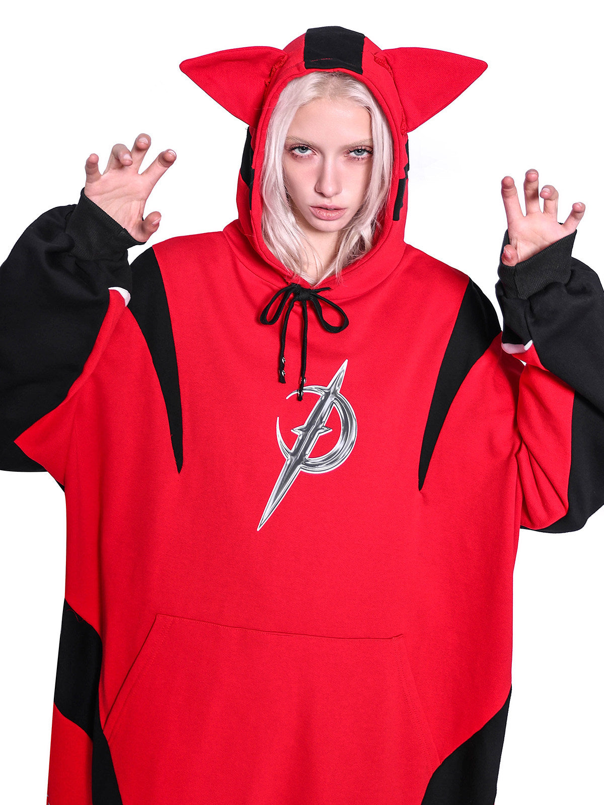 PINKSPINK CAT RACER longline hoodie in red black — close-up of the cat-ear hood with raised hands corresponding to the hero collage