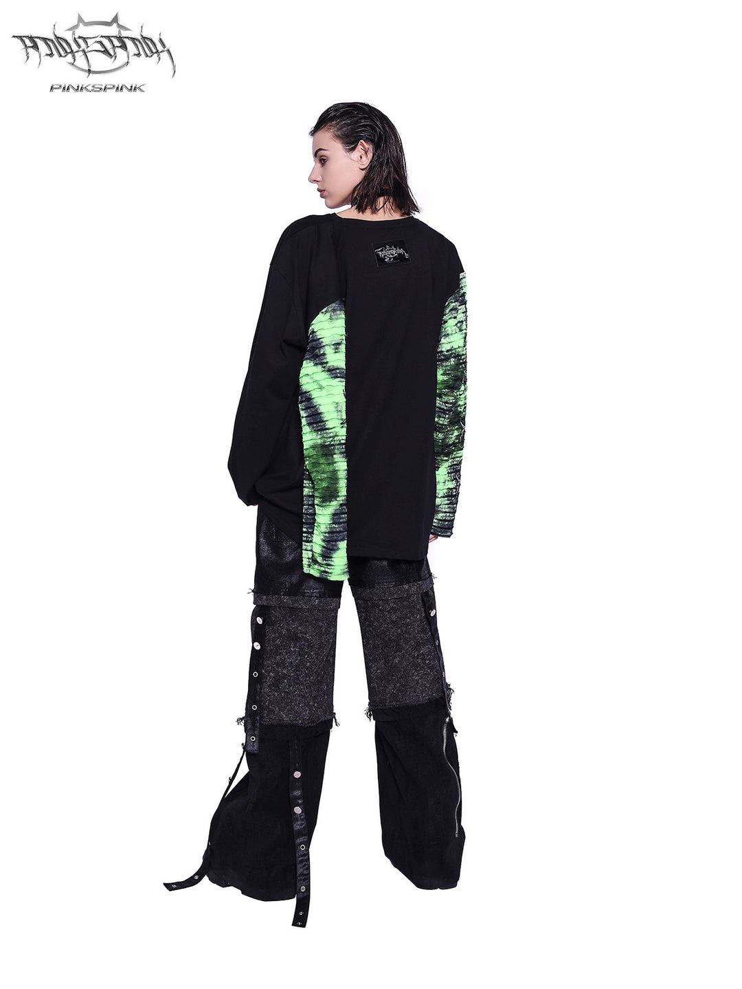 PINKSPINK SPHYNX four-sleeve graphic tee in black green — rear full-length modeled view showing the sleeve construction corresponding to the hero collage
