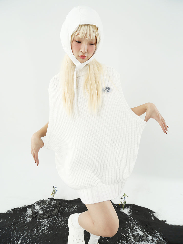 NEXT PASSPORT WHITE LAMB sleeveless turtleneck sweater, front styling over a white hood with arms extended