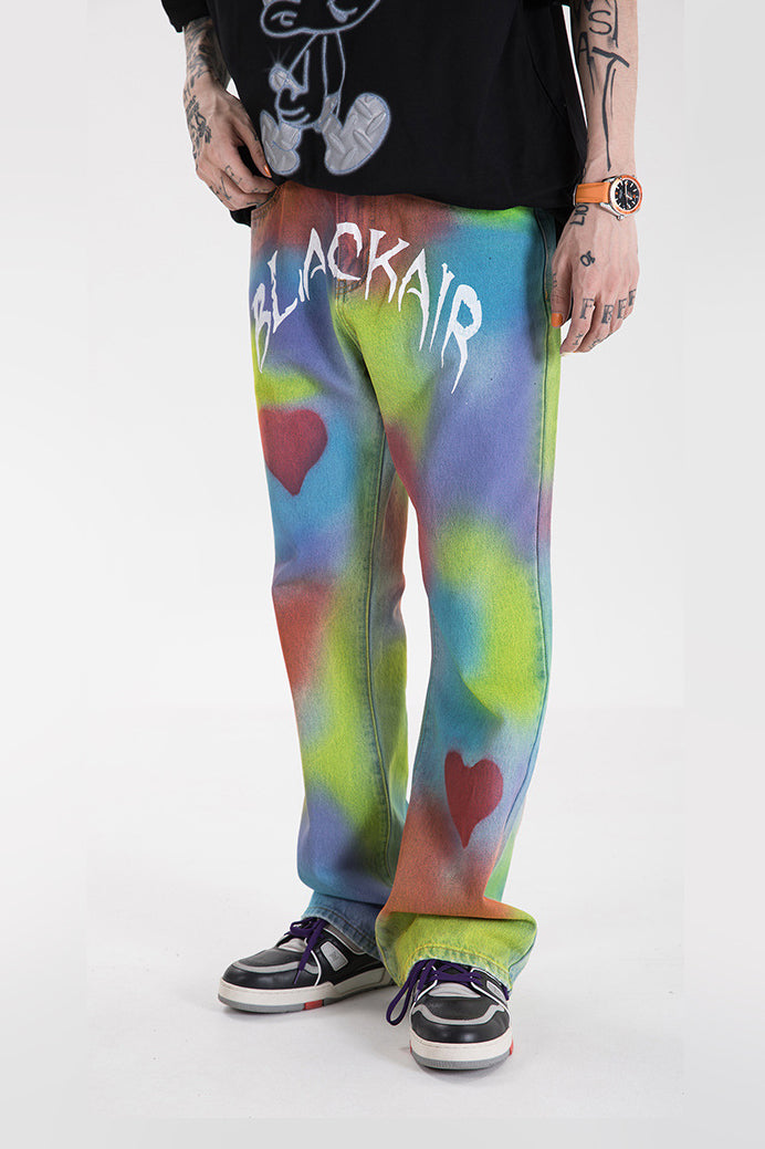 BLACKAIR INKJET LOVE GRAFFITI multicolor heart jeans, front styling with one foot forward