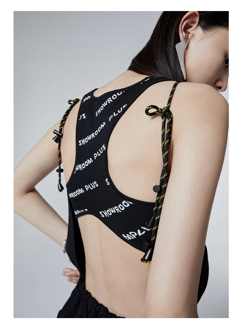 SHOWROOM PLUS HACKWRENCH UTILITY convertible jumpsuit, black, adjustable shoulder cord detail