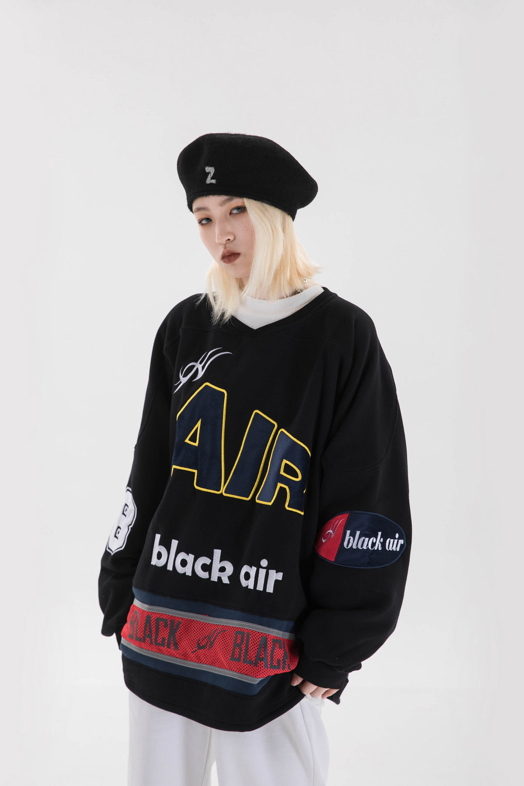 BLACKAIR varsity-letter sweatshirt, black, close front outfit with beret
