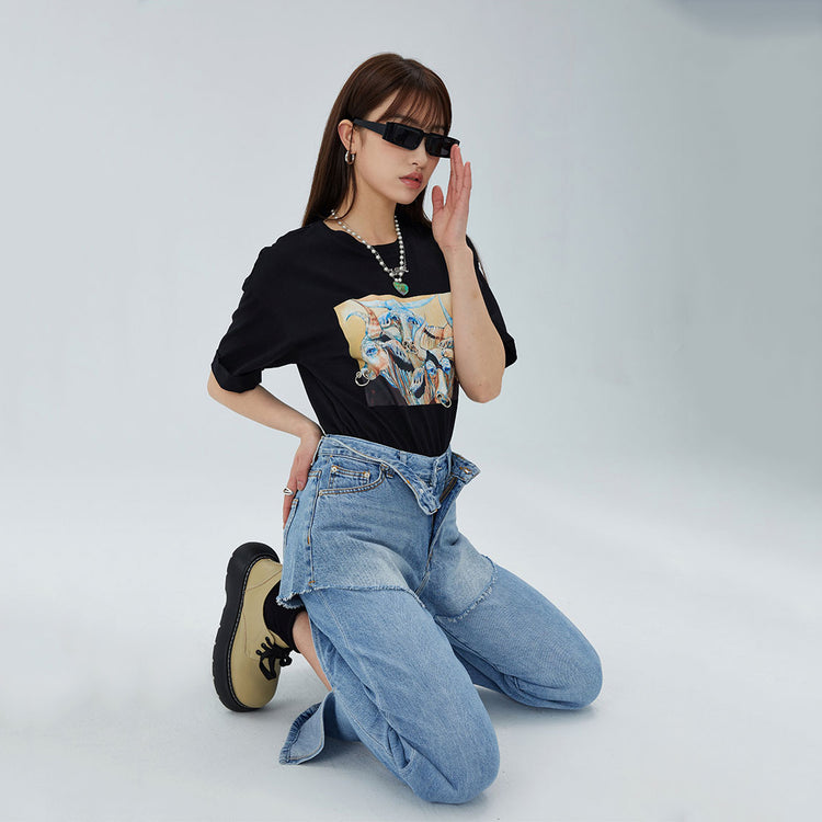 CLICK CHIC HACKWRENCH layered denim shorts, kneeling three-quarter pose over separate jeans