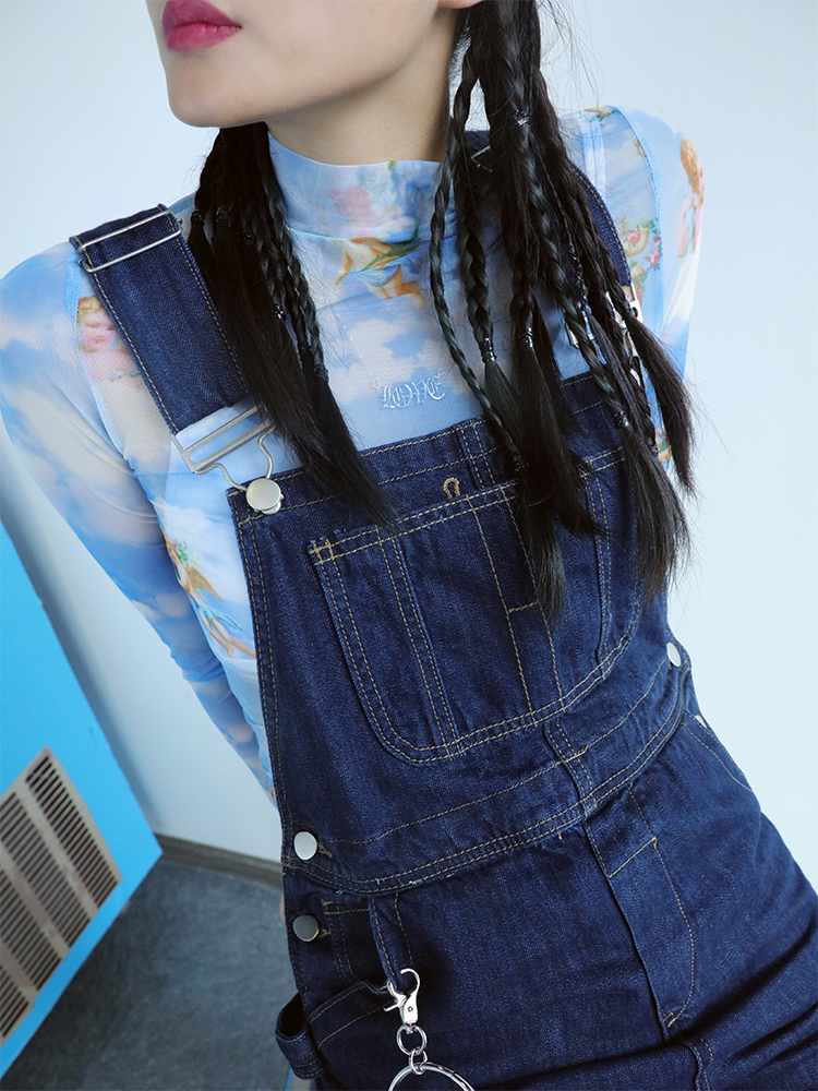 CLICK CHIC ANGEL cherub-print mesh crop top, close high-neck styling under denim overalls