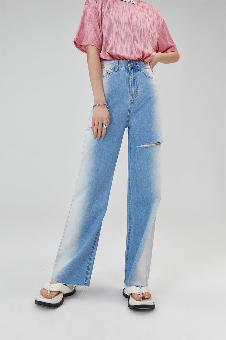 CLICK CHIC BLUE BEAM faded slit-detail jeans, front jeans view with a hand at the waist