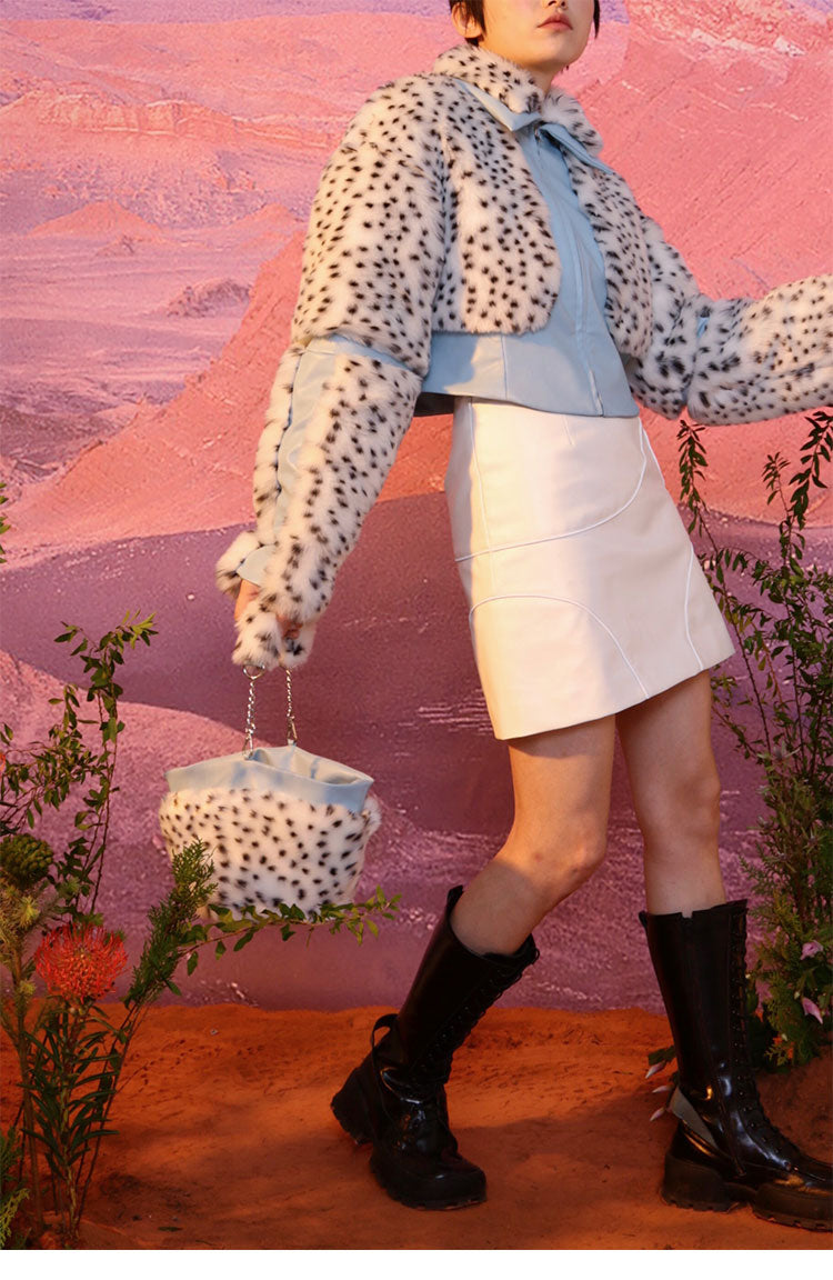 NEXT PASSPORT FUR FUR reversible bucket hat / bag, full outfit carrying it as a chain-handled bag