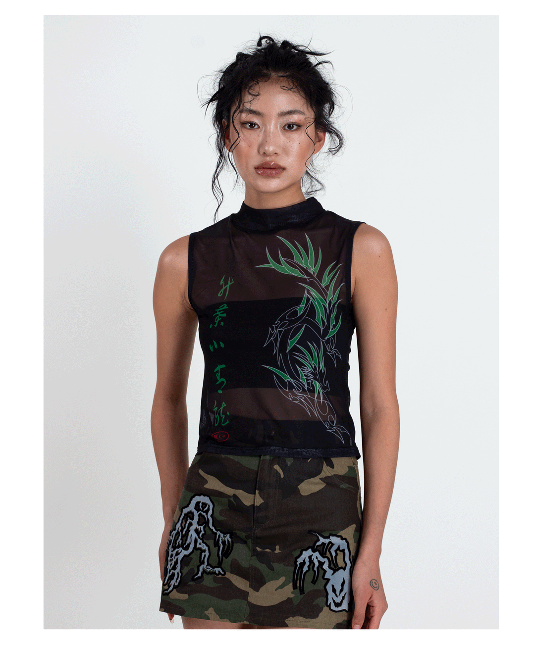 4RE1GN BAMBOO DRAGON sleeveless mesh vest, front styling with camouflage bottoms