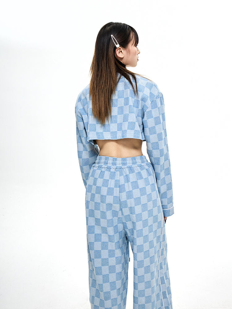 ICIC CHECKER cropped denim baseball jacket, rear styling showing the cropped hem