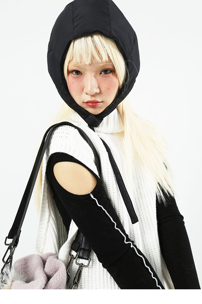 NEXT PASSPORT WHITE LAMB sleeveless turtleneck sweater, side styling over a dark hood