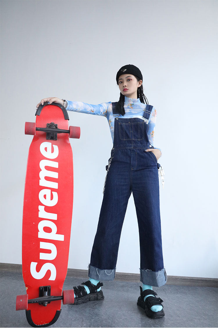 CLICK CHIC ANGEL cherub-print mesh crop top, full standing outfit beside red skateboard