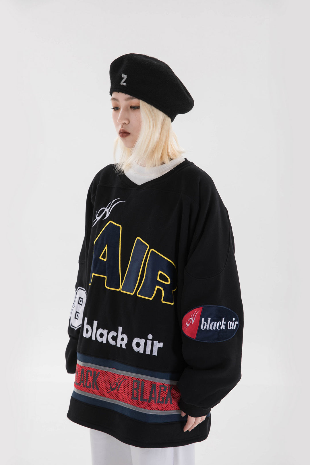 BLACKAIR varsity-letter sweatshirt, black, three-quarter close pose