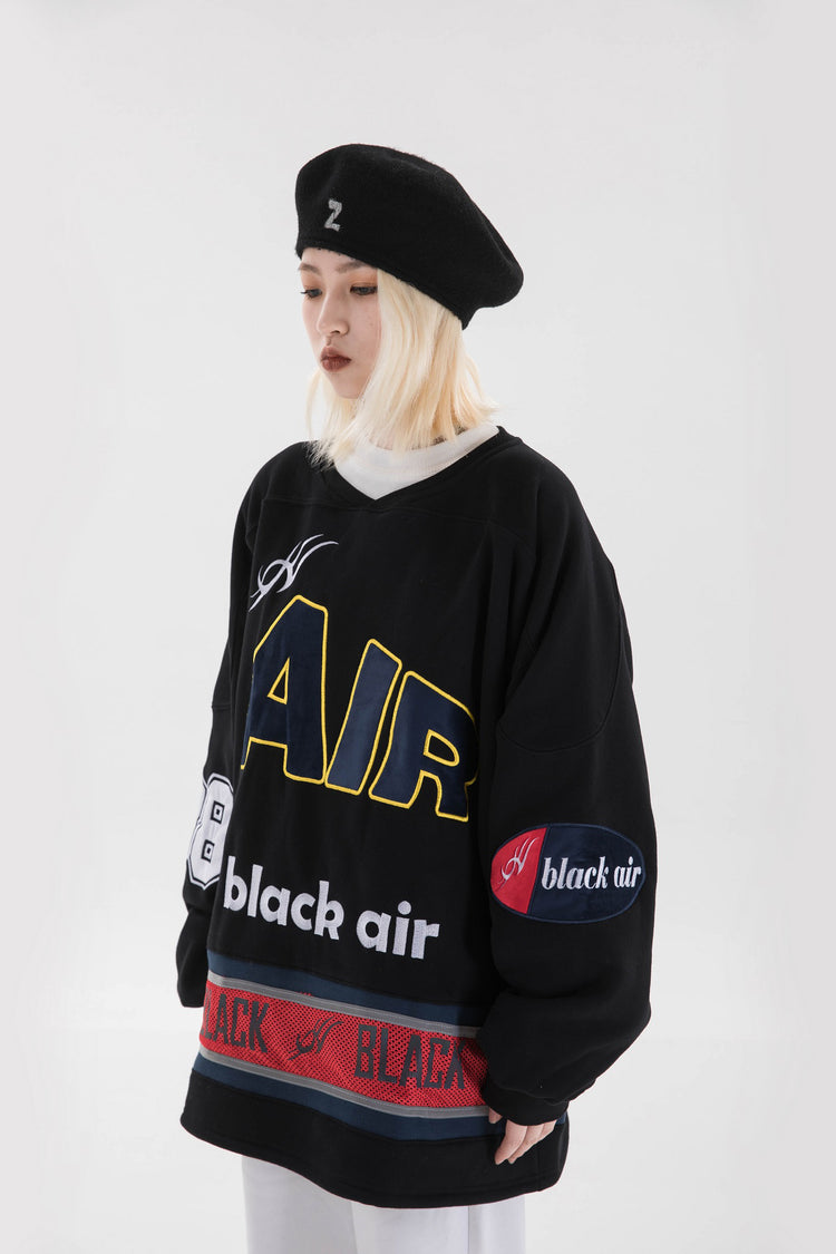 BLACKAIR varsity-letter sweatshirt, black, three-quarter close pose