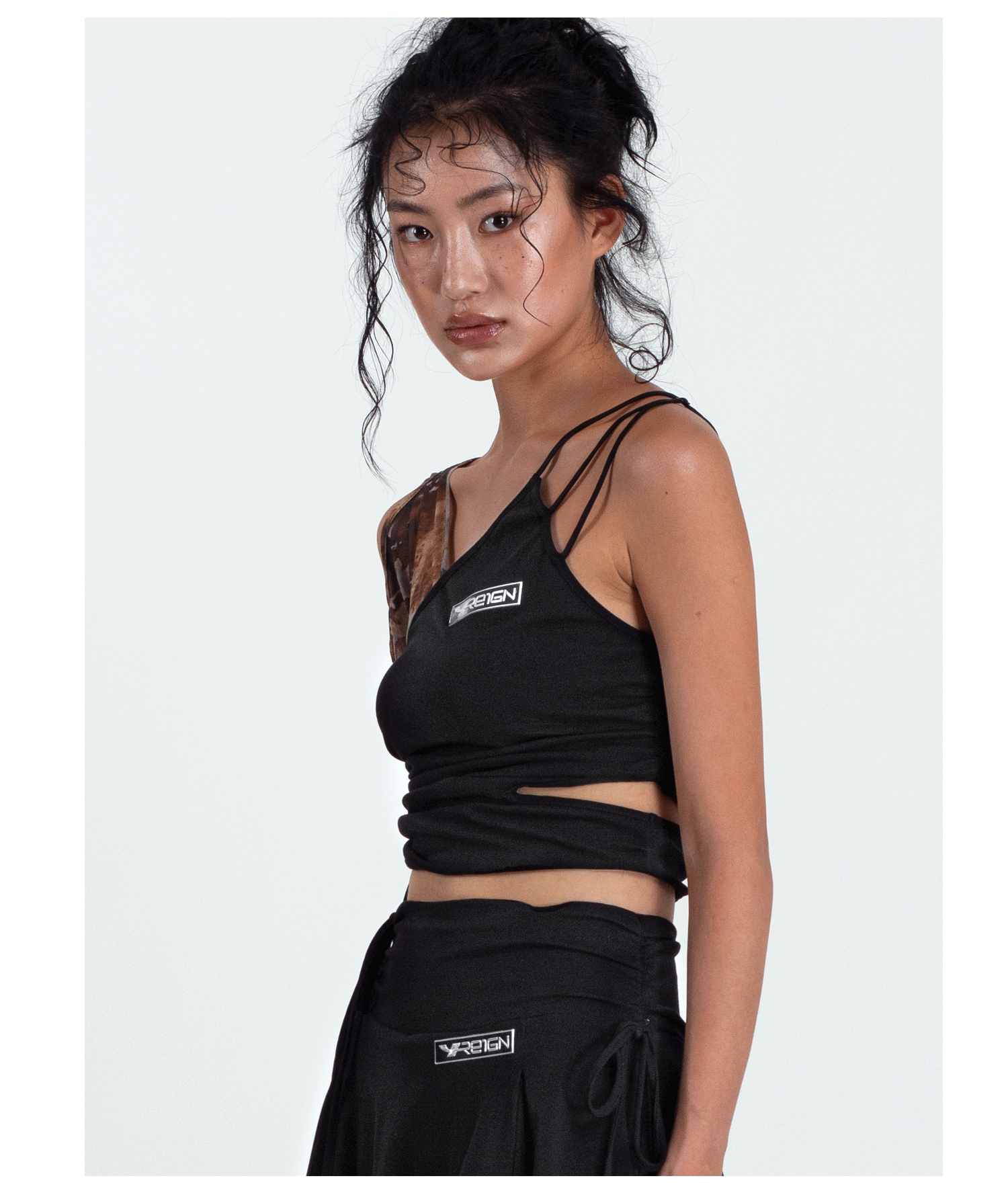4RE1GN TIE-DYE SLEEVE asymmetric crop top, three-quarter front pose