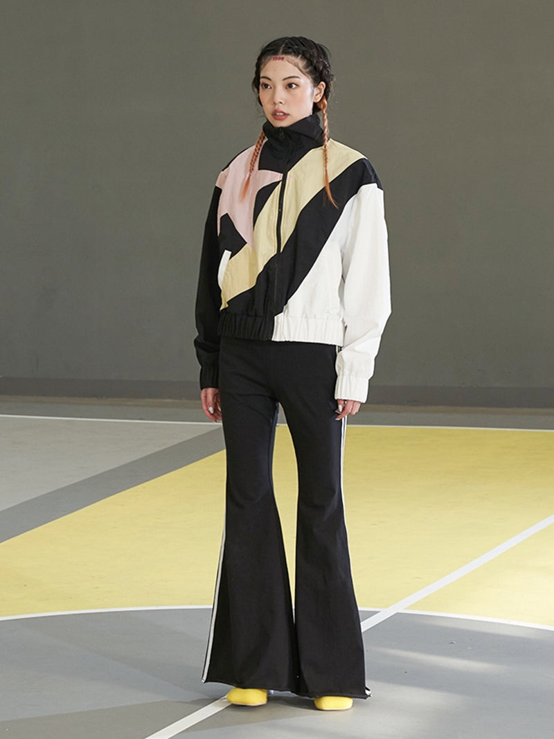 NEXT PASSPORT STAR COLOR BLOCK track jacket, full front styling with pale pants