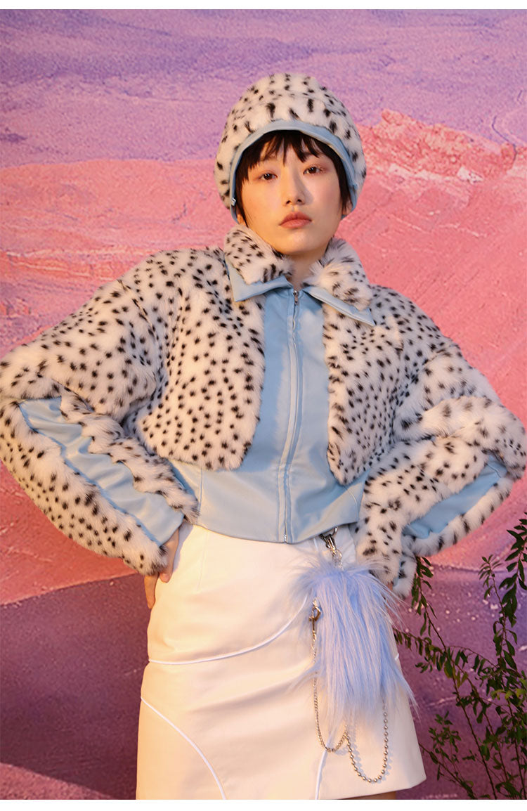 NEXT PASSPORT FUR FUR reversible bucket hat / bag, front hat styling with hands at the waist