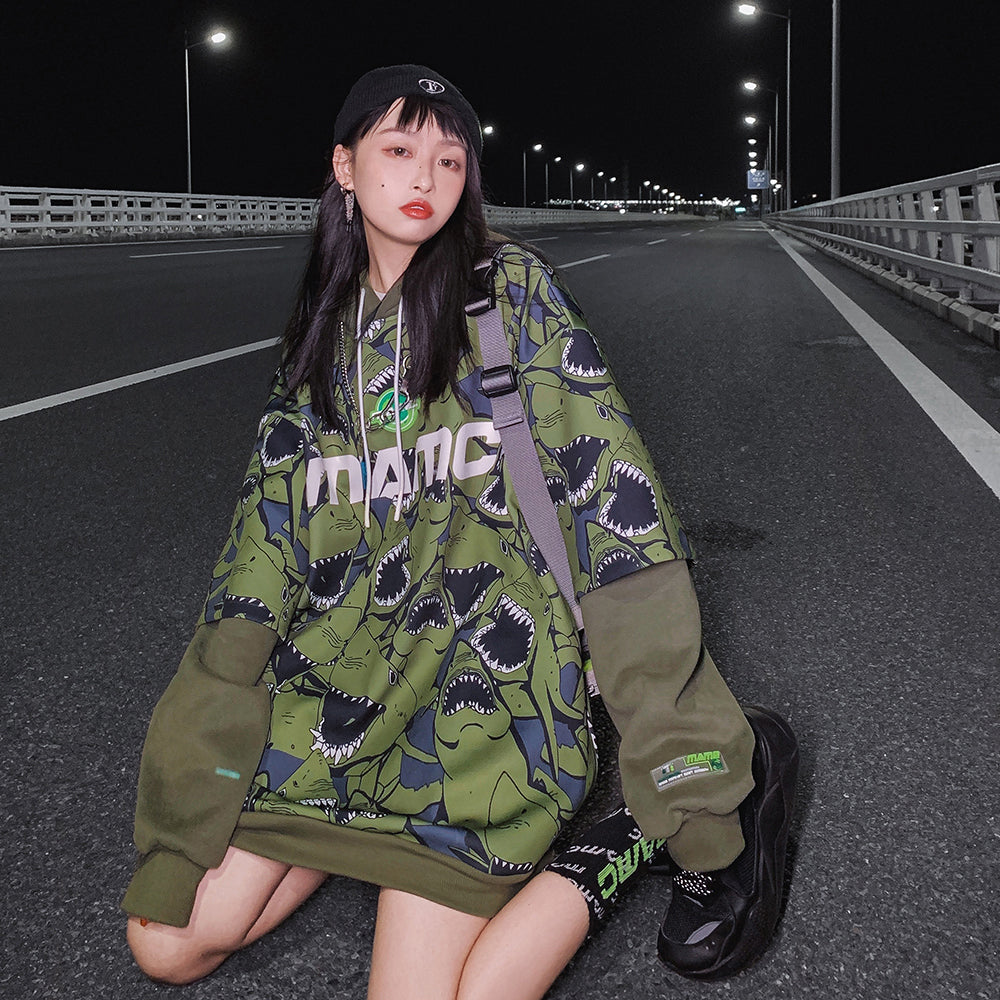 MAMC SHARKS layered-sleeve graphic hoodie, green, seated front outfit